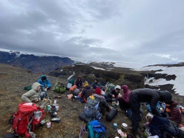 People sitting on a mountain