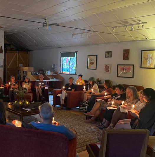 Artists gather in a circle in reflection at the Leavenworth Artist Residency.